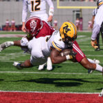 Marcus Carroll dives for a touchdown.