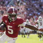 Jalen Milroe runs the ball in an Alabama game in 2024.