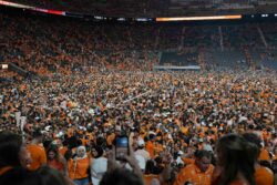 Tennessee fans rush the field after beating Alabama.