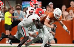 Georgia LB Jalon Walker sacks Quinn Ewers.