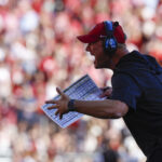 Alabama's Kalen DeBoer coaches.