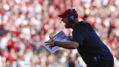 Alabama's Kalen DeBoer coaches.