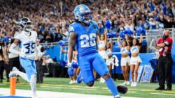 Jahmyr Gibbs scores a touchdown in 2024.