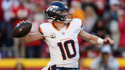 Denver Broncos quarterback Bo Nix throws a pass.