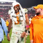 Nico Iamaleava walks off the field.