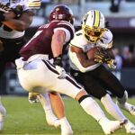 Nate Noel runs the ball for the Missouri Tigers in a win over Mississippi State in Starkville.