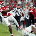 Oklahoma linebacker Kip Lewis returns an interception for a touchdown against Alabama.
