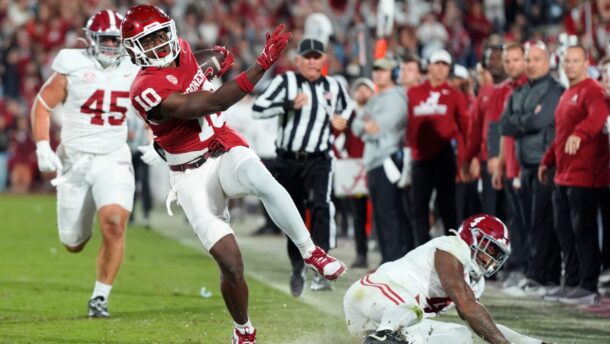 Oklahoma linebacker Kip Lewis returns an interception for a touchdown against Alabama.