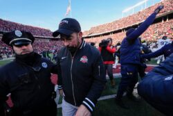 Ryan Day walks off the field after Ohio State's home loss to unranked Michigan.