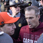 South Carolina head coach Shane Beamer and Clemson head coach Dabo Swinney.