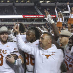 Texas coach Steve Sarkisian and players celebrate.