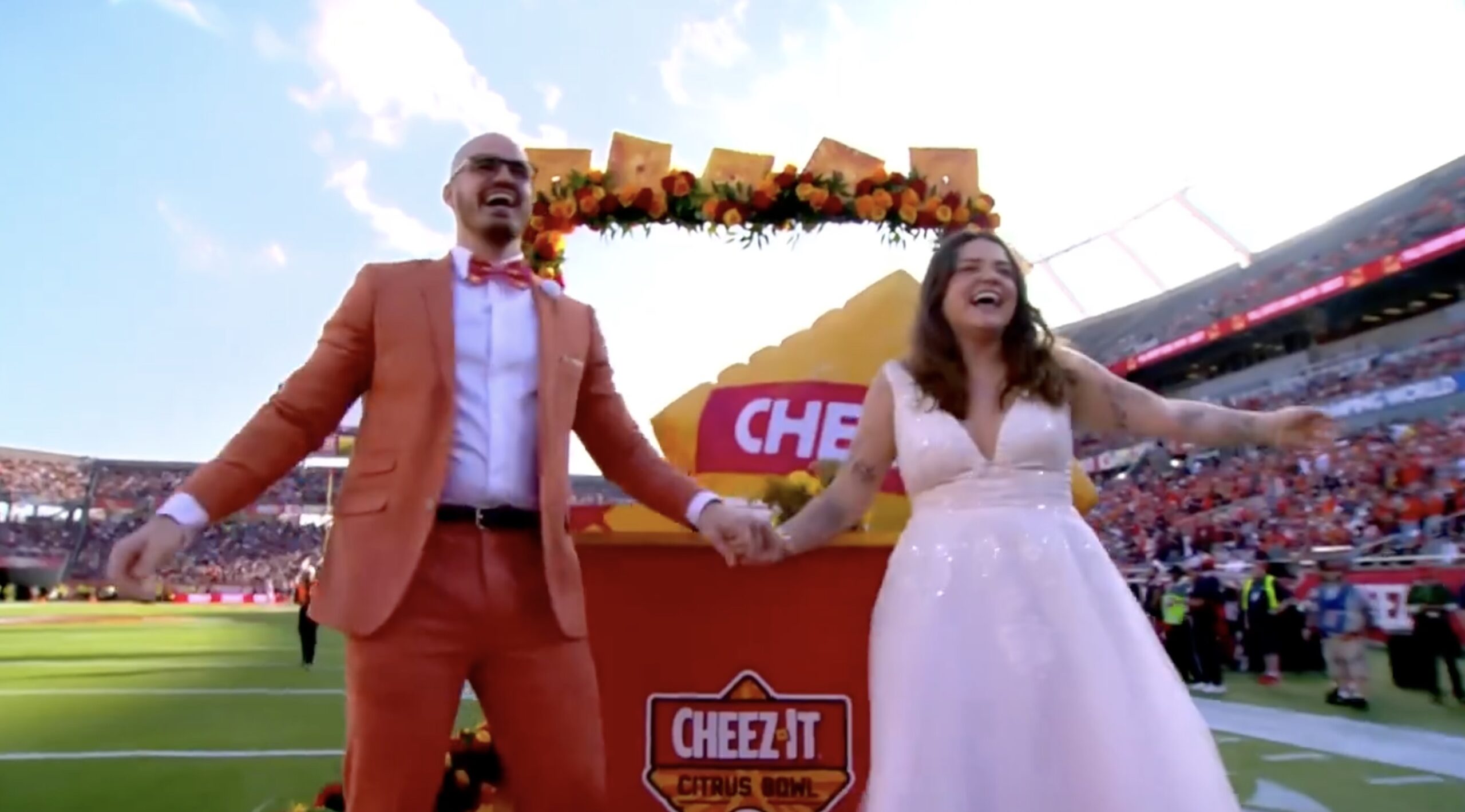 Cheez-It mascot officiates mid-game wedding during Citrus Bowl