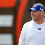Freddie Kitchens is shown coaching.
