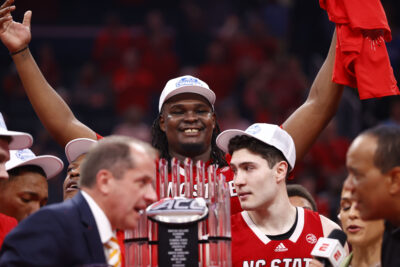 DJ Burns, Michael O'Connell and ACC commissioner Jim Phillips.