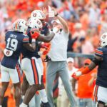 Auburn defensive coordinator celebrates a big play.