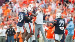 Auburn defensive coordinator celebrates a big play.