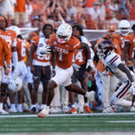 Johntay Cook is shown catching a pass.