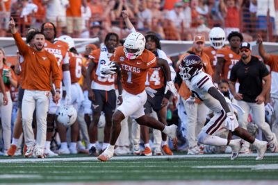 Johntay Cook is shown catching a pass.