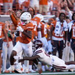 Texas WR Johntay Cook II in action.