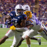 Fluff Bothwell runs the ball against LSU.
