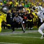 Michigan State defensive back Charles Brantley intercepts a pass.