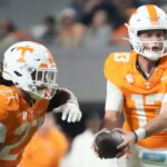 Gaston Moore hands the ball off during a Tennessee game in 2024.