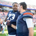 Auburn OL Percy Lewis is shown coming off the field.