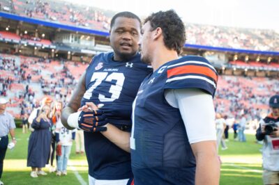 Auburn OL Percy Lewis is shown coming off the field.