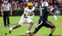 Kewan Lacy runs the ball for the Missouri Tigers during a game against South Carolina in 2024.