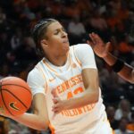 Tennessee guard Cameron Carr looks to pass.