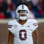 Michael Van Buren celebrates after Mississippi State scored a touchdown in the Egg Bowl