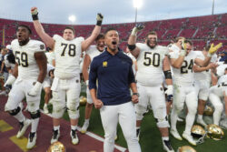 Notre Dame head coach Marcus Freeman is shown.