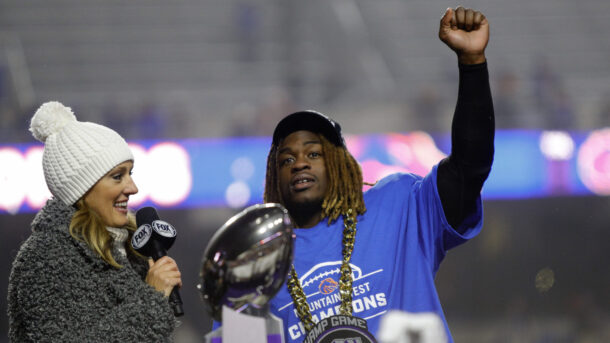 Ashton Jeanty celebrates Boise State's Mountain West championship.