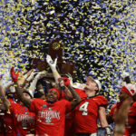 SEC Championship Game winners Georgia celebrate with confetti.