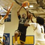 AJ Dybantsa drives to the basket.