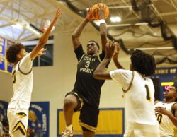 AJ Dybantsa drives to the basket.