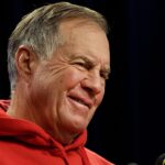 Bill Belichick talks at a press conference.