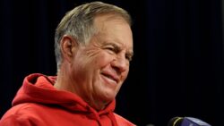 Bill Belichick talks at a press conference.