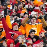Ohio State and Tennessee fans cheer on their teams.