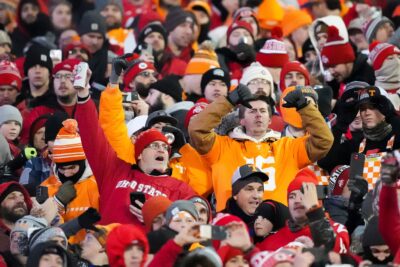 Ohio State and Tennessee fans cheer on their teams.