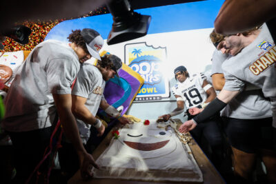 Iowa State players take some Pop-Tarts after the win.