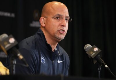 James Franklin speaking at a press conference.