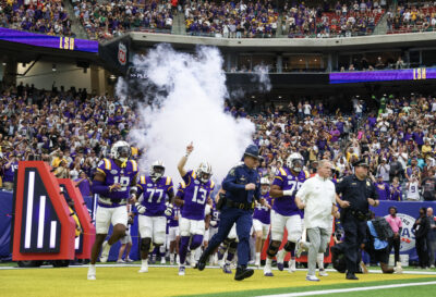 LSU runs out of the tunnel at the Texas Bowl.