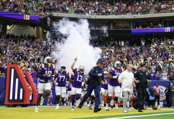LSU runs out of the tunnel at the Texas Bowl.