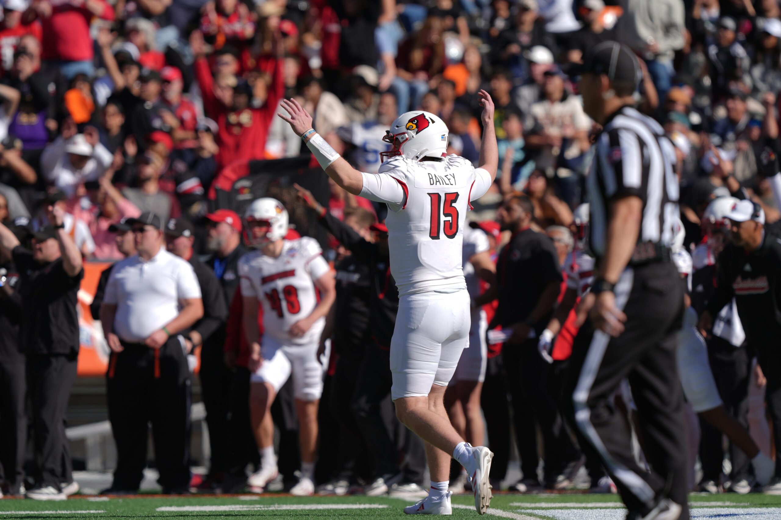 Louisville hangs on after zany end to electric Sun Bowl vs. Washington