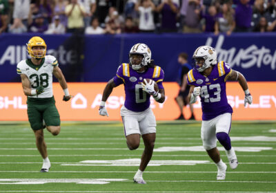Zavion Thomas returns a kickoff for a touchdown in the Texas Bowl.