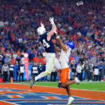 Tyler Warren soars for a TD grab.