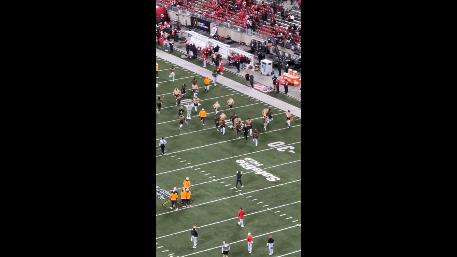 Tennessee players emerge shirtless for warmups ahead of kickoff vs. Ohio State