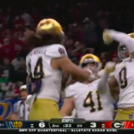 Notre Dame defenders celebrate.