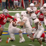 Quinn Ewers gets a pass off.
